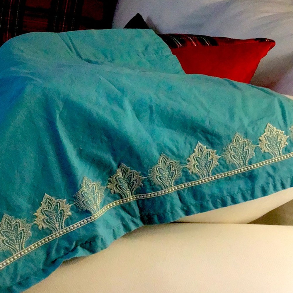 Curtain Valance 48”w x 17”l . Turquoise with white embroidery detail.